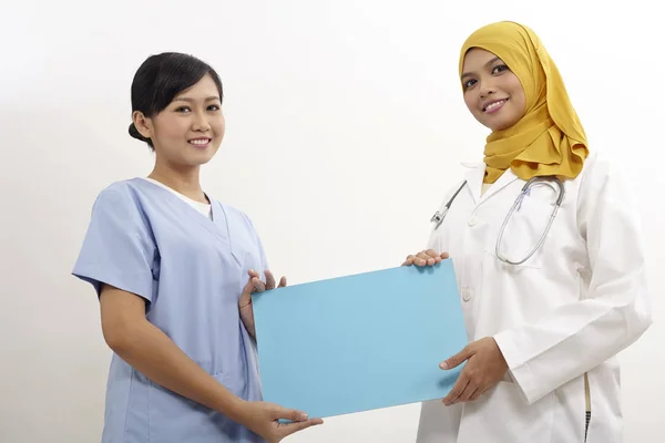 Female doctor and nurse — Stock Photo, Image