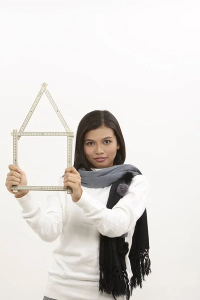 Malay Woman Holding Folderable Ruler Form House Shape — Stock Photo, Image
