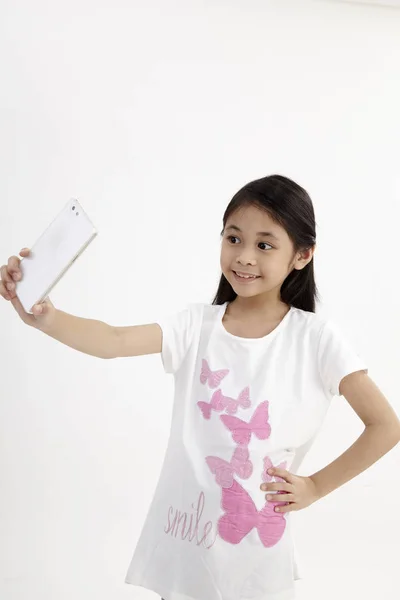 Childhood Technology Cute Little Girl Using Smart Phone Isolated White — Stock Photo, Image