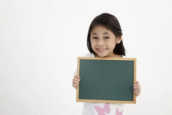 Cute Little Girl Holding Chalkboard Isolated White — Stock Photo, Image
