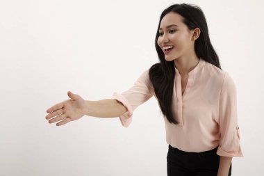 kol yetiştirme malay kadın yaklaşık el sallamak