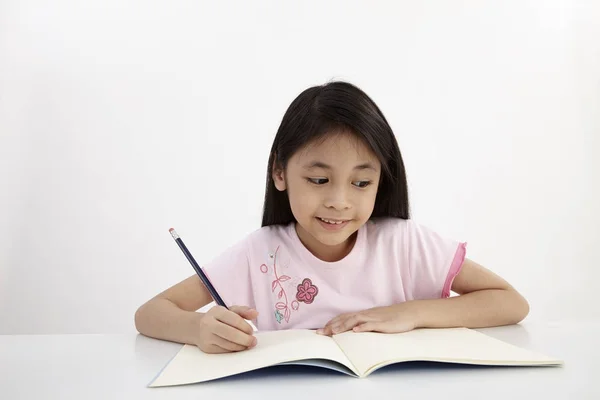 Kislány Írás Csinál Házi Feladatot — Stock Fotó