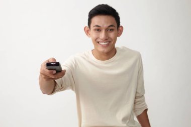 Malay genç holding uzaktan kumanda kanal geçiş 