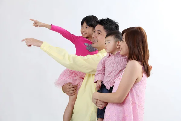 Chinese Family Pointing Looking One Direction — Stock Photo, Image