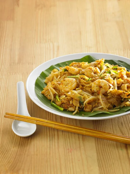 Top View Malaysian Famous Food Penang Fried Kuey Teow Stock Photo by