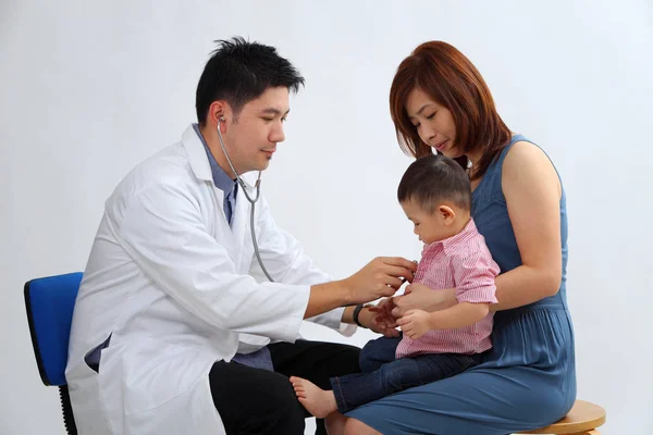 chinese doctor with a young patient