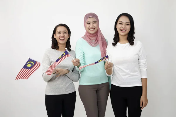 マレーシアのフラグを保持する若い女性 — ストック写真