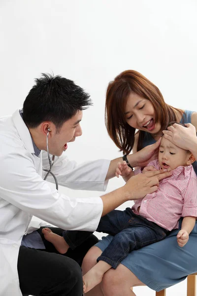 chinese doctor with a young patient