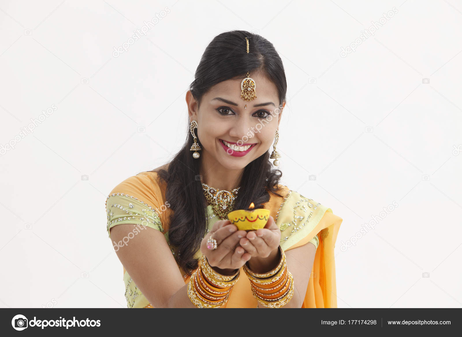 Indian Woman Glamorous Traditional Clothing Holding Oil Lamp Stock Indian Woman In Glamorous Traditional Clothing Holding Oil Lamp Photo By Eskaylim Find Similar Images