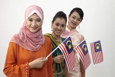 young women holding malaysia flags clipart