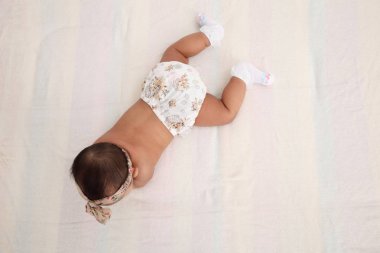 yaklaşık taramaya dönüm malay bebeğin Üstten Görünüm