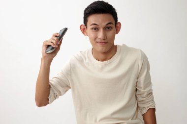 Malay genç holding uzaktan kumanda kanal geçiş 