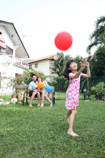 Happy Chinese Family Playing Garden — Stock Photo, Image