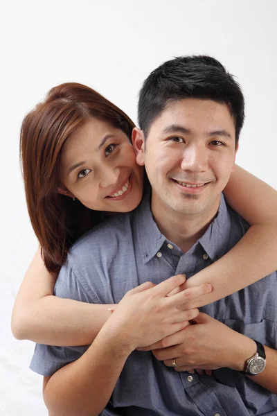 Woman Hugging Back Looking Camera — Stock Photo, Image