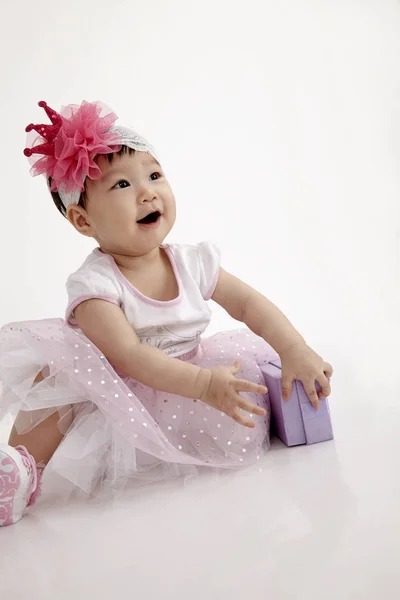 Chinese Baby Wearing Party Dress Purple Gift Box — Stock Photo, Image