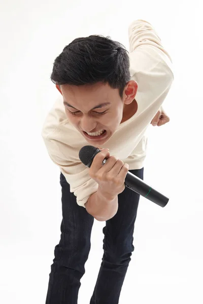 Hombre Sosteniendo Micrófono Inalámbrico Cantando —  Fotos de Stock