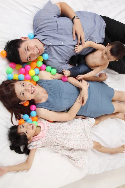 Top View Family Laying Bed — Stock Photo, Image