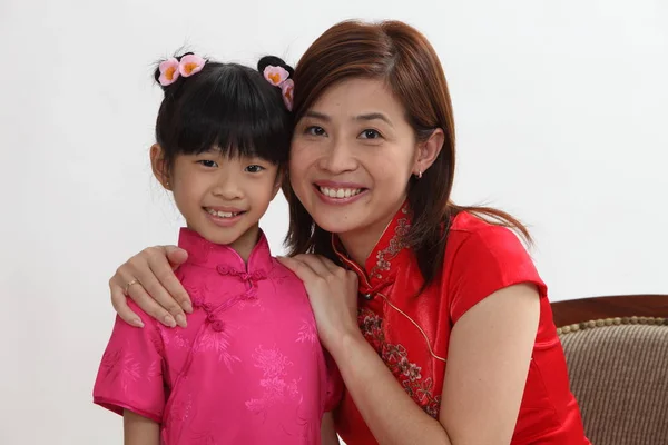 chinese mother and her daughter with traditional clothing