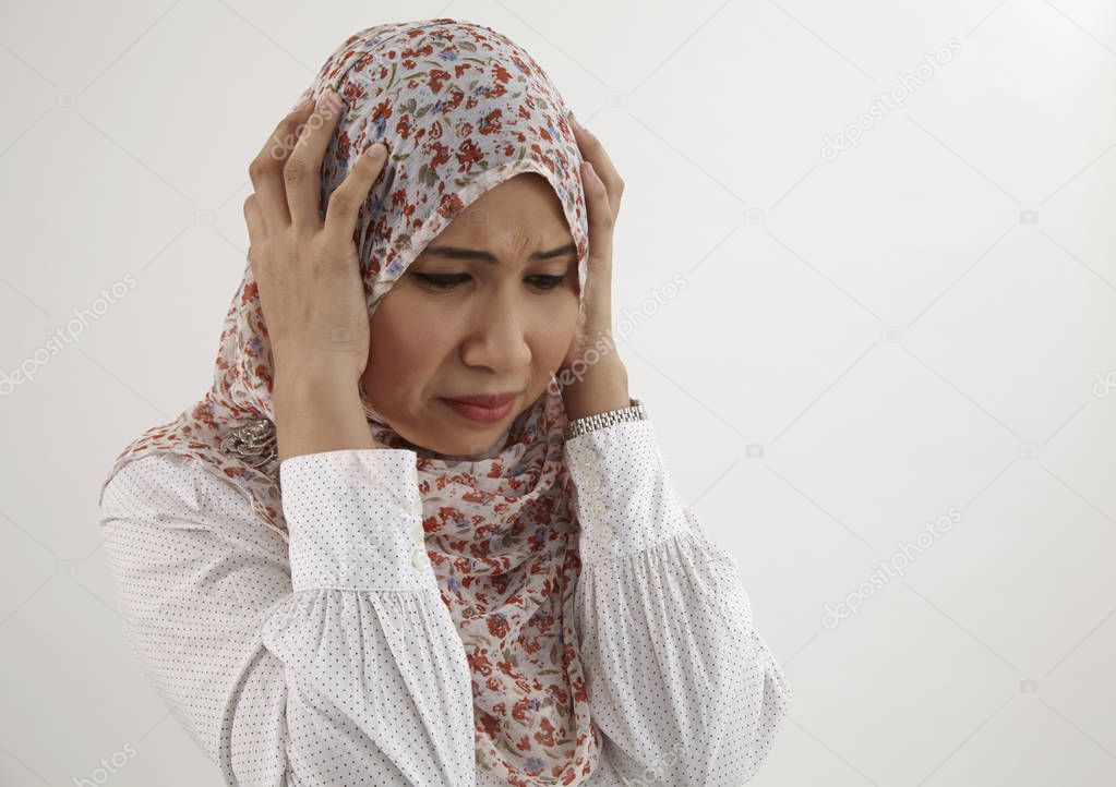 malay woman with sad and uncomfort expression