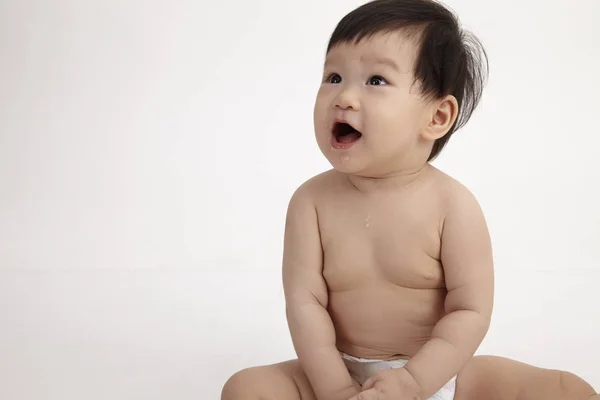 Chinese Baby Girl Sitting Surprise Expression — Stock Photo, Image