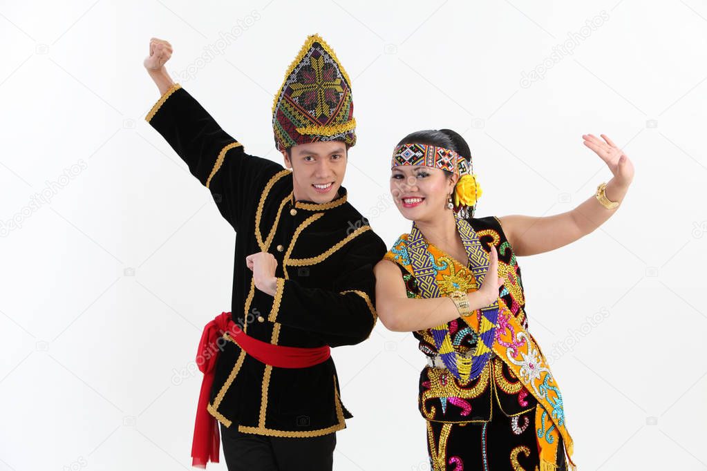 couple from borneo dancing and posing in studio