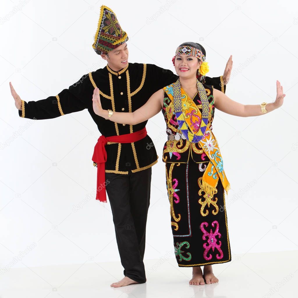 couple from borneo dancing and posing in studio