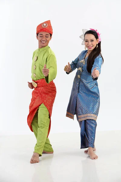 stock image  malay couple in traditional costumes posing in studio