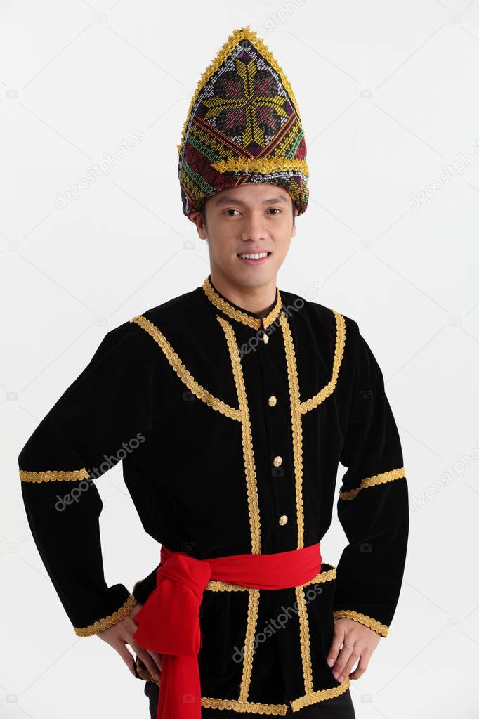 man from Borneo wearing traditional  costume 