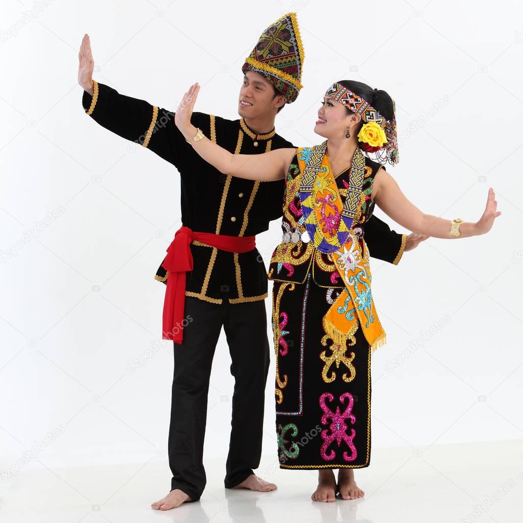 couple from borneo dancing and posing in studio