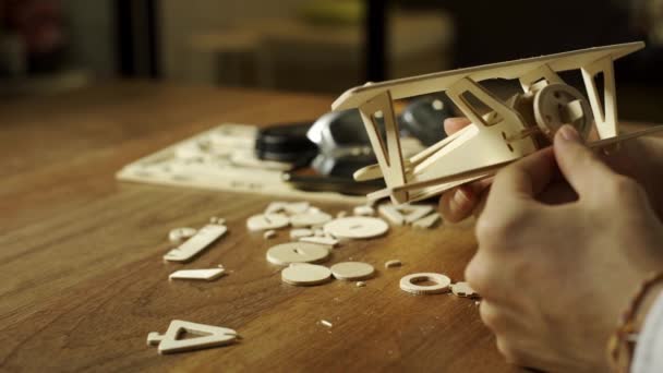 Man Working Wooden Airplane Model — Stock Video