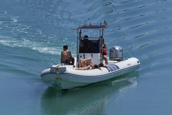 Italy, Sicily, Mediterranean Sea, Marina di Ragusa (Ragusa Province); 4 June 2017, people on a rubber boat in the port - EDITORIAL — Stock Photo, Image