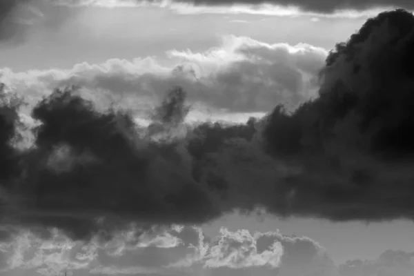 Italy, Sicily, Mediterranean Sea, clouds in the sky at sunset