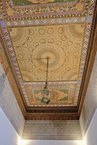 Morocco, Marrakech, El Bahia Palace, paintings and ornaments in the ceiling of one of the rooms