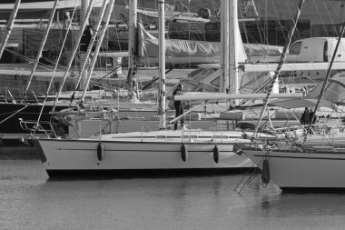 Italy, Sicily, Mediterranean Sea, Marina di Ragusa (Ragusa Province); 21 February 2020, people on a sailing boat in the port - EDITORIAL