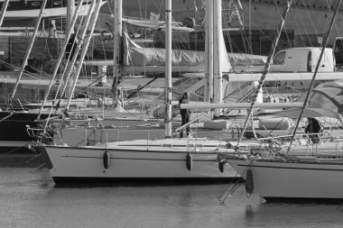 Italy, Sicily, Mediterranean Sea, Marina di Ragusa (Ragusa Province); 21 February 2020, people on a sailing boat in the port - EDITORIAL