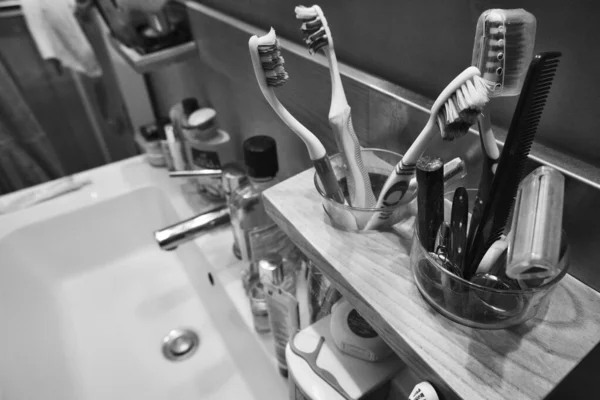 Accessories and products on a private bathroom sink