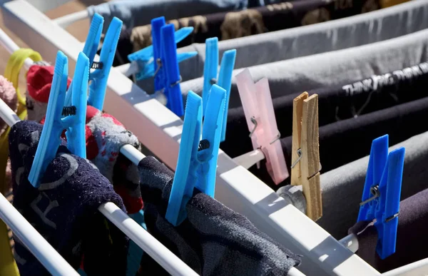 Washed clothes on a drying rack