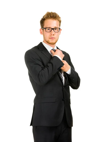 Young, handsome business man wearing black suit. — Stock Photo, Image