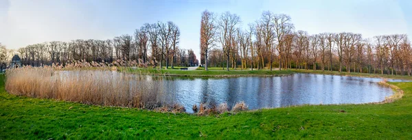 Panoramic view at Sunset, early spring. Herrenhausen Gardens, Hannover, Germany. — Stock Photo, Image