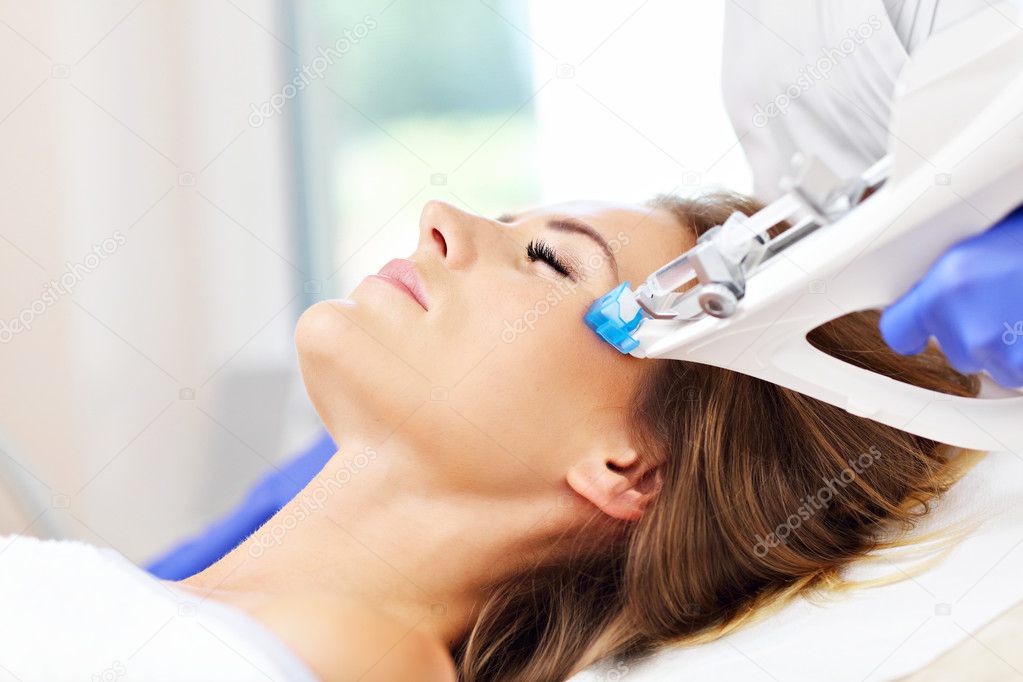  woman having facial mesotherapy
