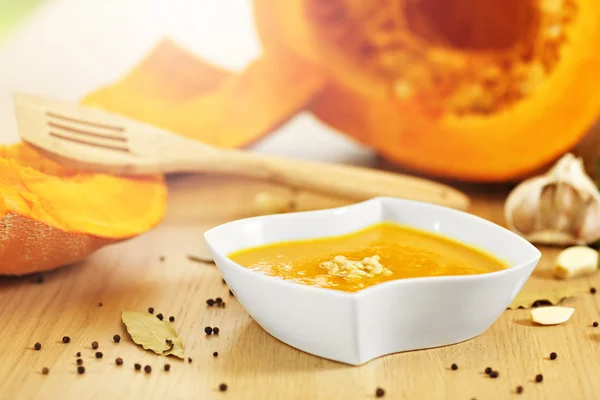 Pumpkin creamy soup with pinia nuts — Stockfoto