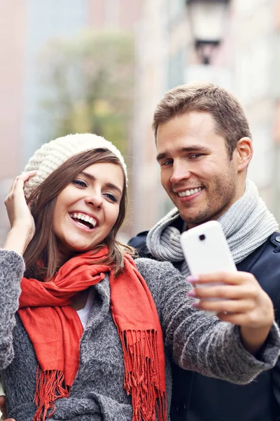 Young couple taking selfie — Stock Photo, Image