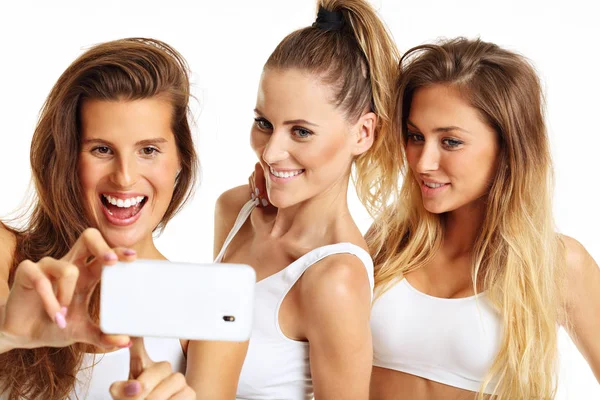Group of happy friends posing in underwear — Stock Photo, Image