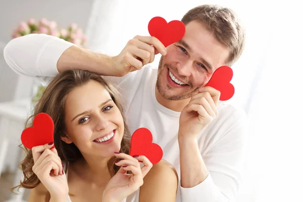 Playful couple in bedroom Royalty Free Stock Images