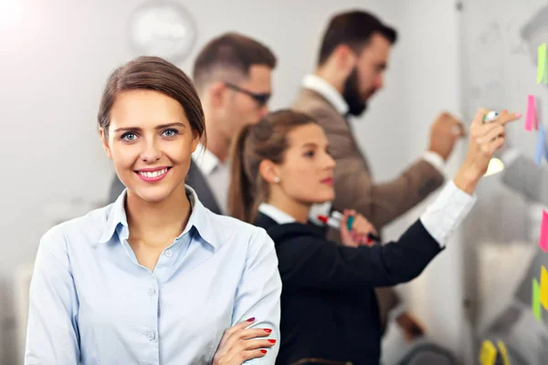 Confident businessman and her team — Stock Photo, Image