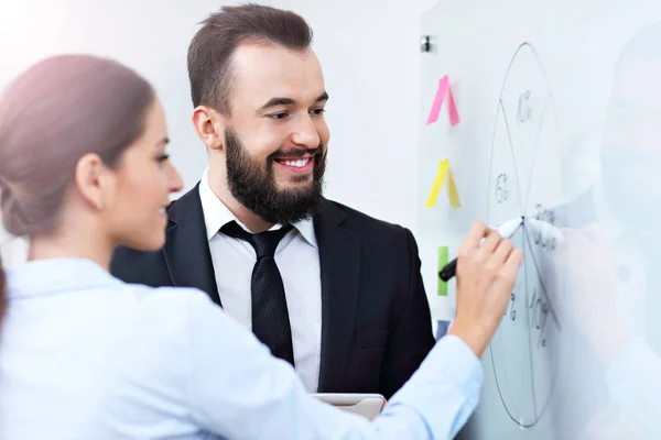 Businesspeople working together in office — Stock Photo, Image