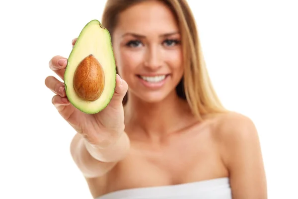 Attractive adult woman with avocado — Stock Photo, Image