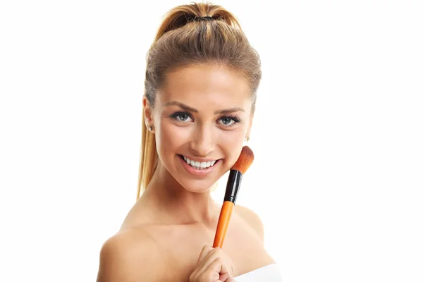 T woman with the makeup brush — Stock Photo, Image