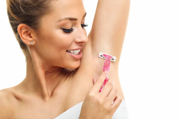 Adult woman shaving armpit — Stock Photo, Image