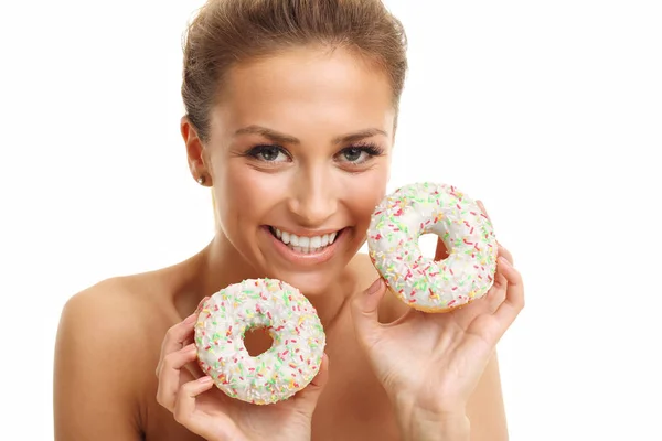 Mujer posando con rosquillas — Foto de Stock